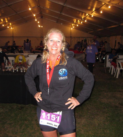 Mikel Ann Hall shortly after completing her first Ironman in New Zealand on March 2, 2013.