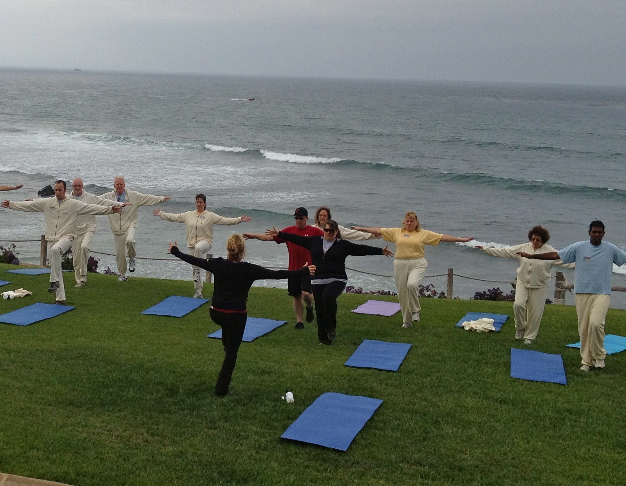 The RESET winners working out ocean side with Kathy Kaehler