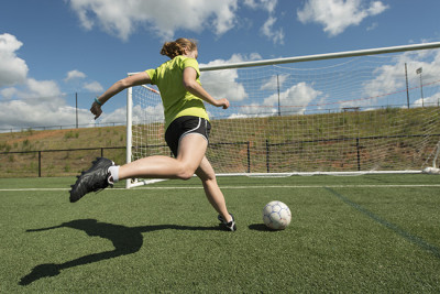 Teen Playing Soccer