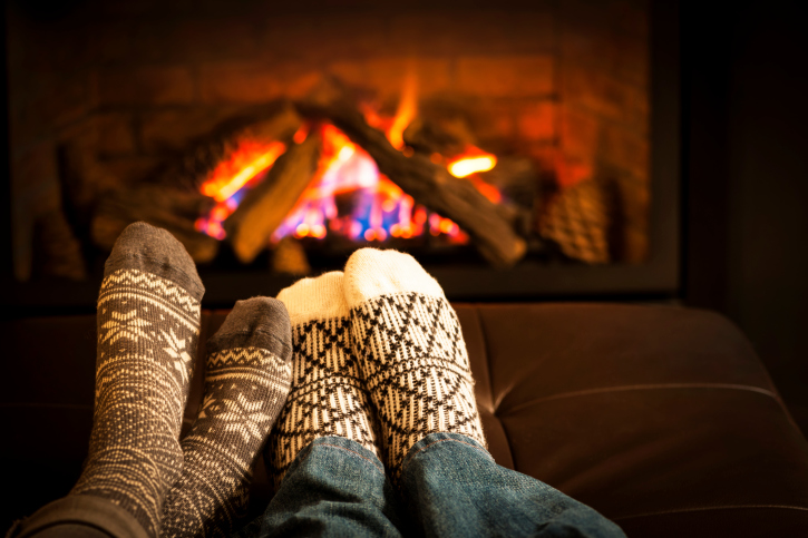 feet by fireplace